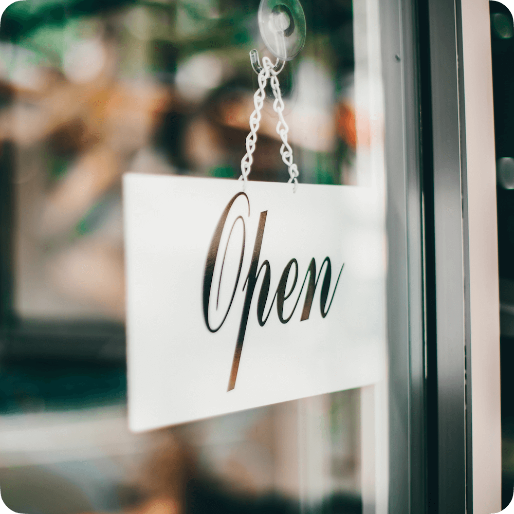 Open sign in window of restaurant
