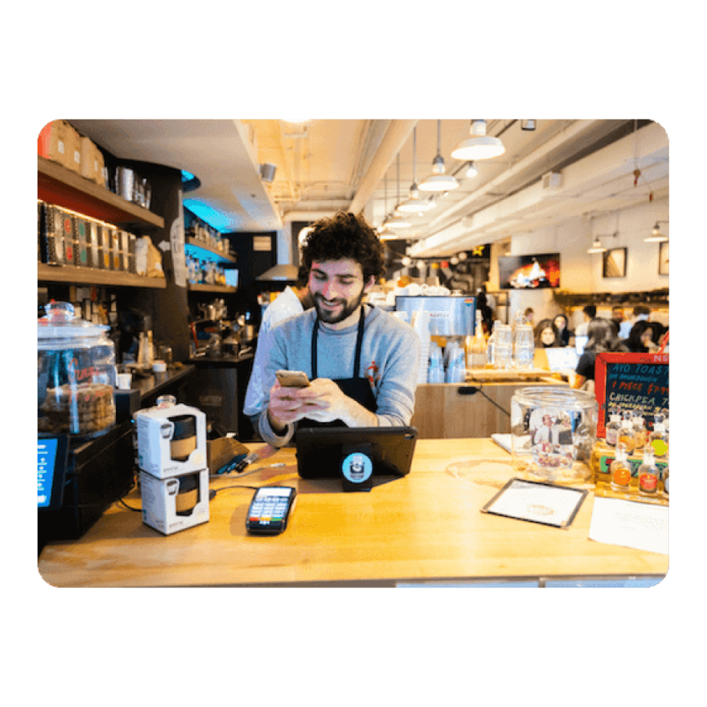 Restaurant owner at work using a restaurant software tool